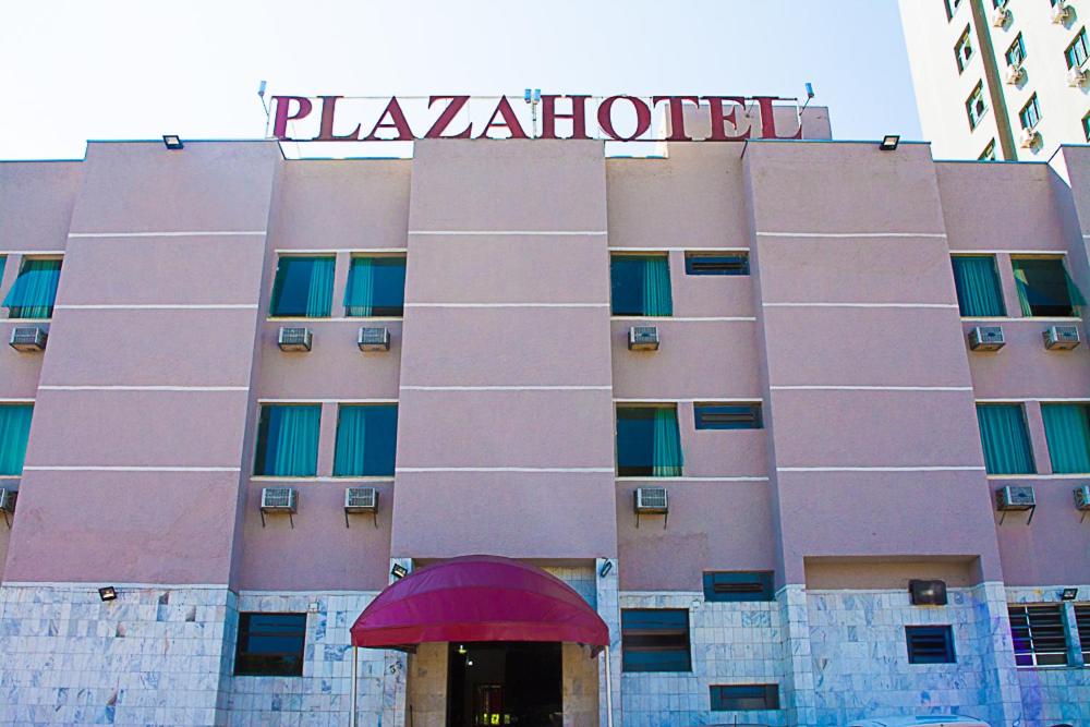 a hotel with a sign on the front of it at Plaza Hotel São José dos Campos in São José dos Campos