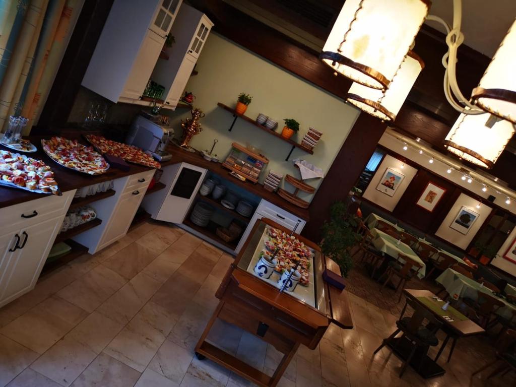 Kuchyňa alebo kuchynka v ubytovaní Hotel - Pension Scheiblechner