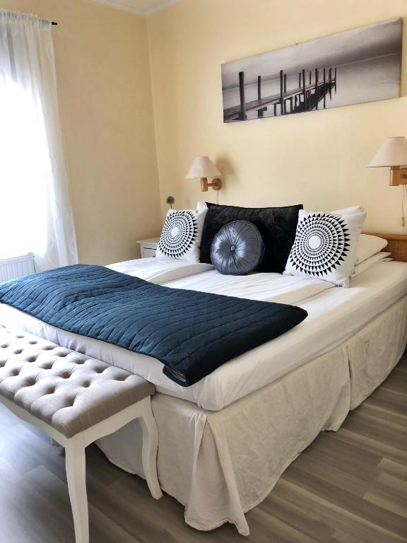 Postel nebo postele na pokoji v ubytování Hotell Björnidet