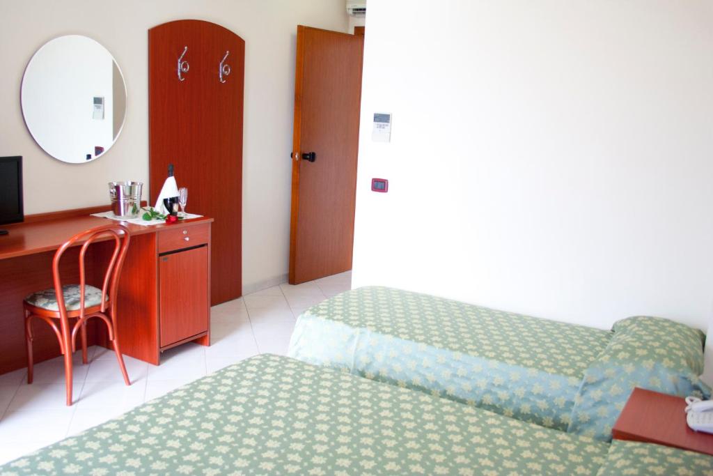Letto o letti in una camera di Hotel Felix