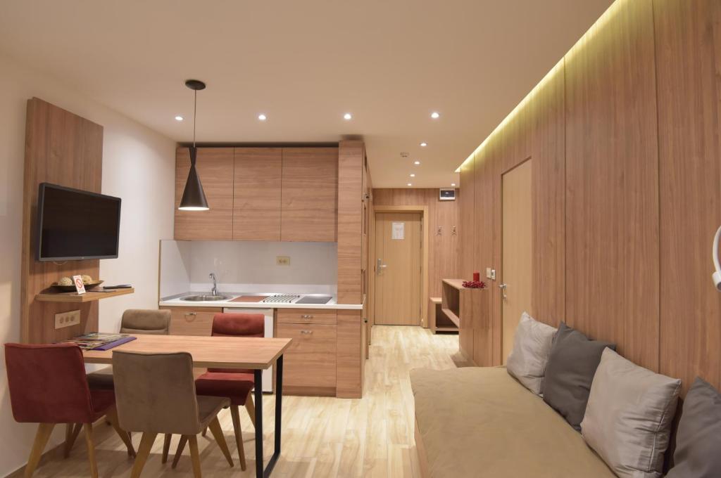 Un televizor și/sau centru de divertisment la Apartmani Prime