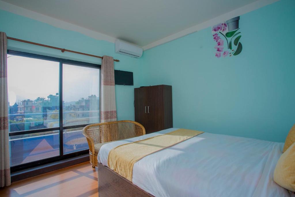 Postel nebo postele na pokoji v ubytování Hotel Golden Three