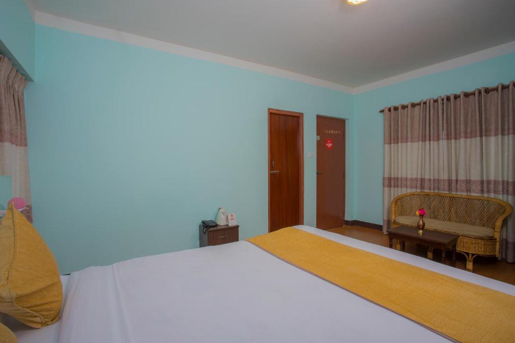 Postel nebo postele na pokoji v ubytování Hotel Golden Three
