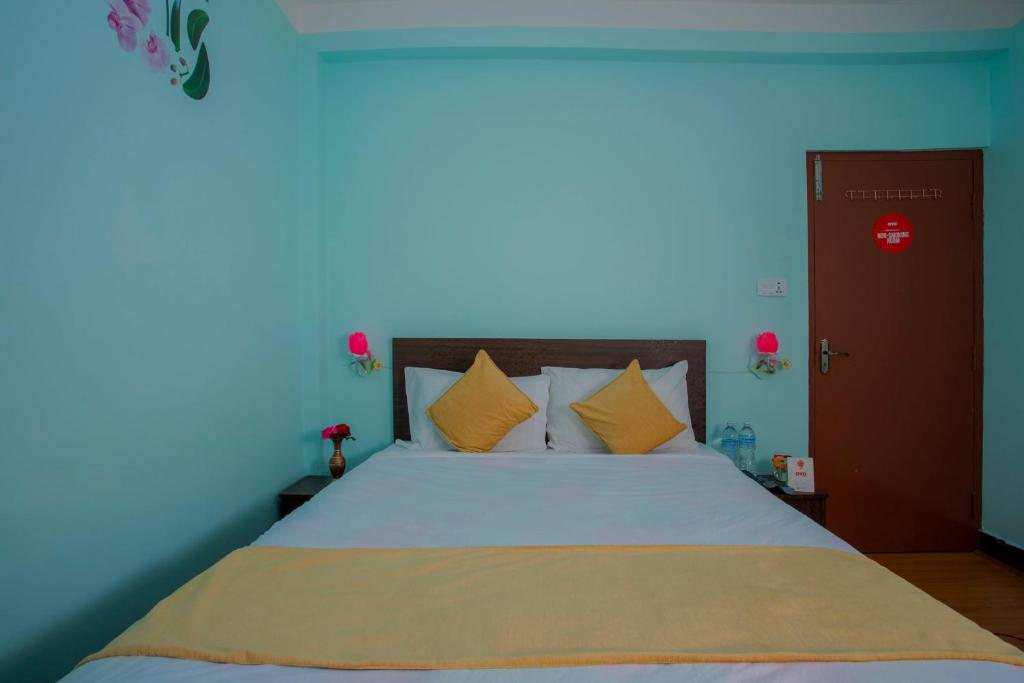 Postel nebo postele na pokoji v ubytování Hotel Golden Three