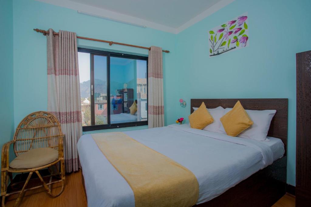 Postel nebo postele na pokoji v ubytování Hotel Golden Three