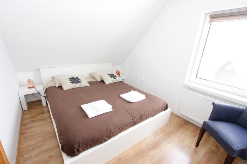 Postel nebo postele na pokoji v ubytování Villa Maximus