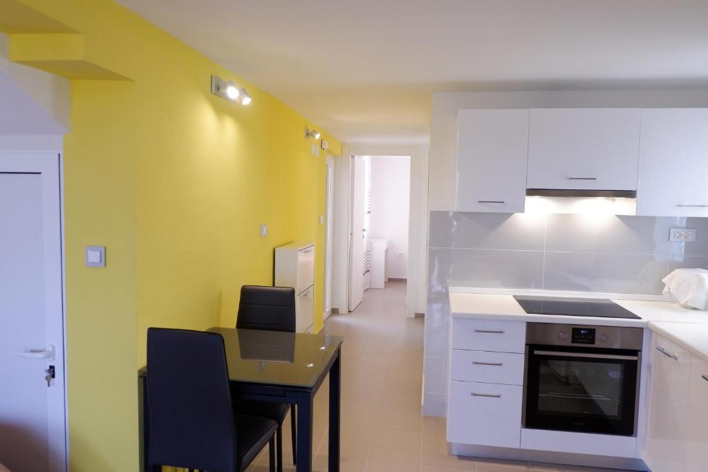 Kuchyň nebo kuchyňský kout v ubytování Apartment Marija