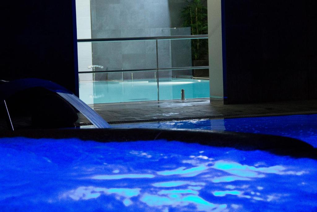 Бассейн в Hotel Spa Galatea или поблизости