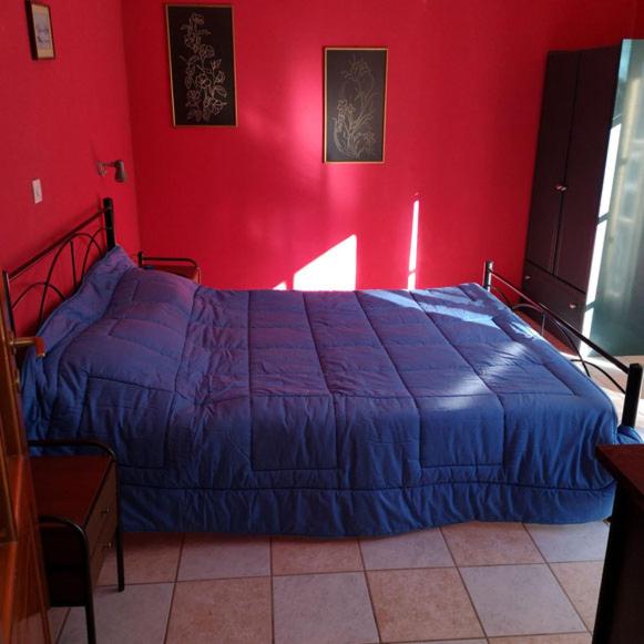 Posteľ alebo postele v izbe v ubytovaní Rigos Apartments