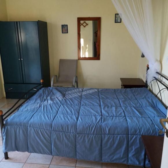 Posteľ alebo postele v izbe v ubytovaní Rigos Apartments
