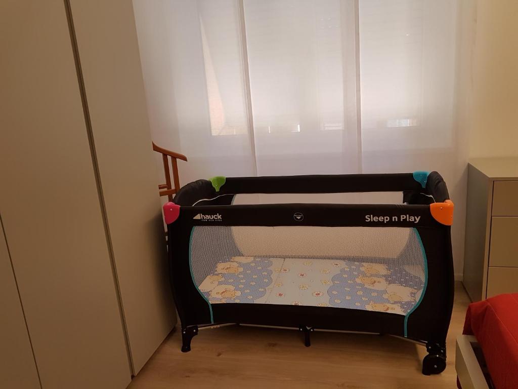 Łóżko lub łóżka w pokoju w obiekcie Chez George