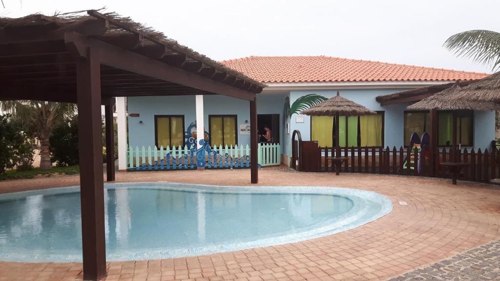 Bazén v ubytování Private Apartment At Tortuga Beach Resort and Spa nebo v jeho okolí