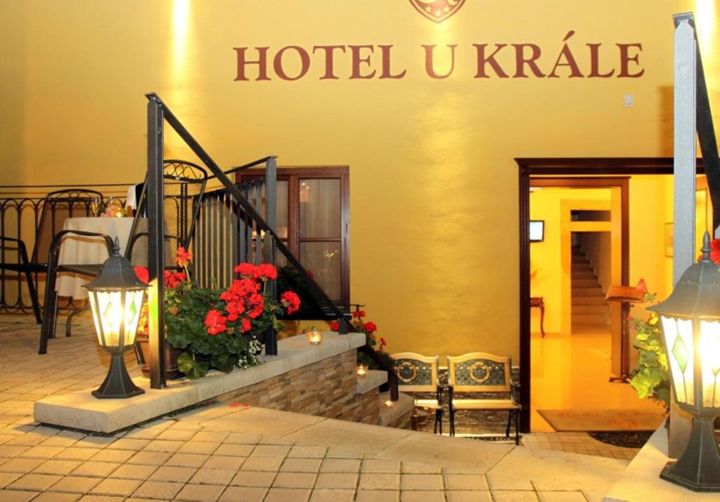 a hotel ukraille sign on the side of a building at Hotel U Krále in Jičín