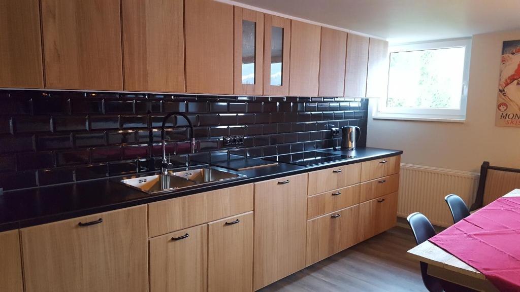 Kuchyň nebo kuchyňský kout v ubytování De Nussi's chalet 2
