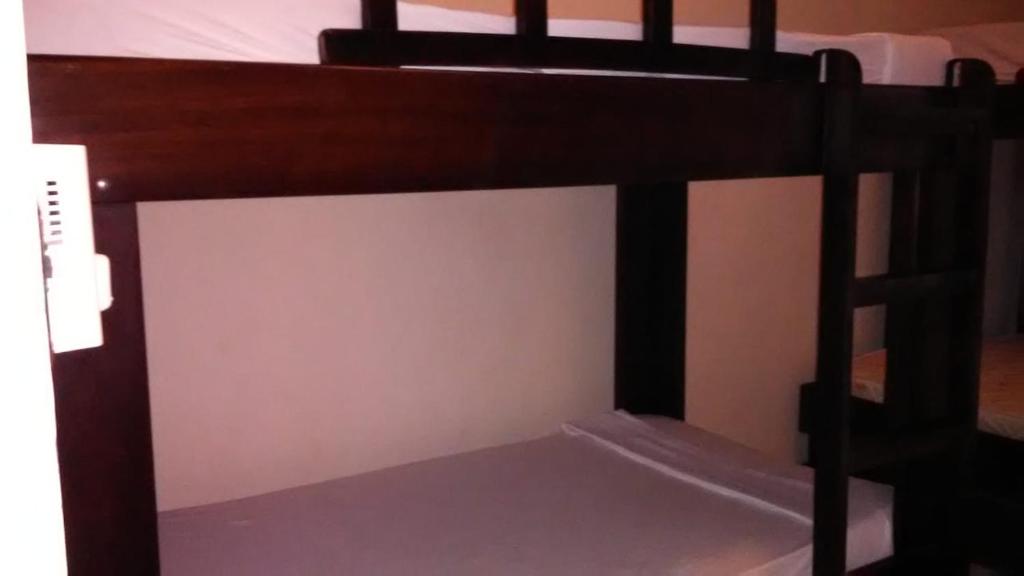 Postel nebo postele na pokoji v ubytování Cabinas surf Arribadas