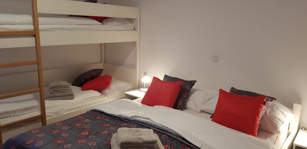 Postel nebo postele na pokoji v ubytování Apartments Vijolica