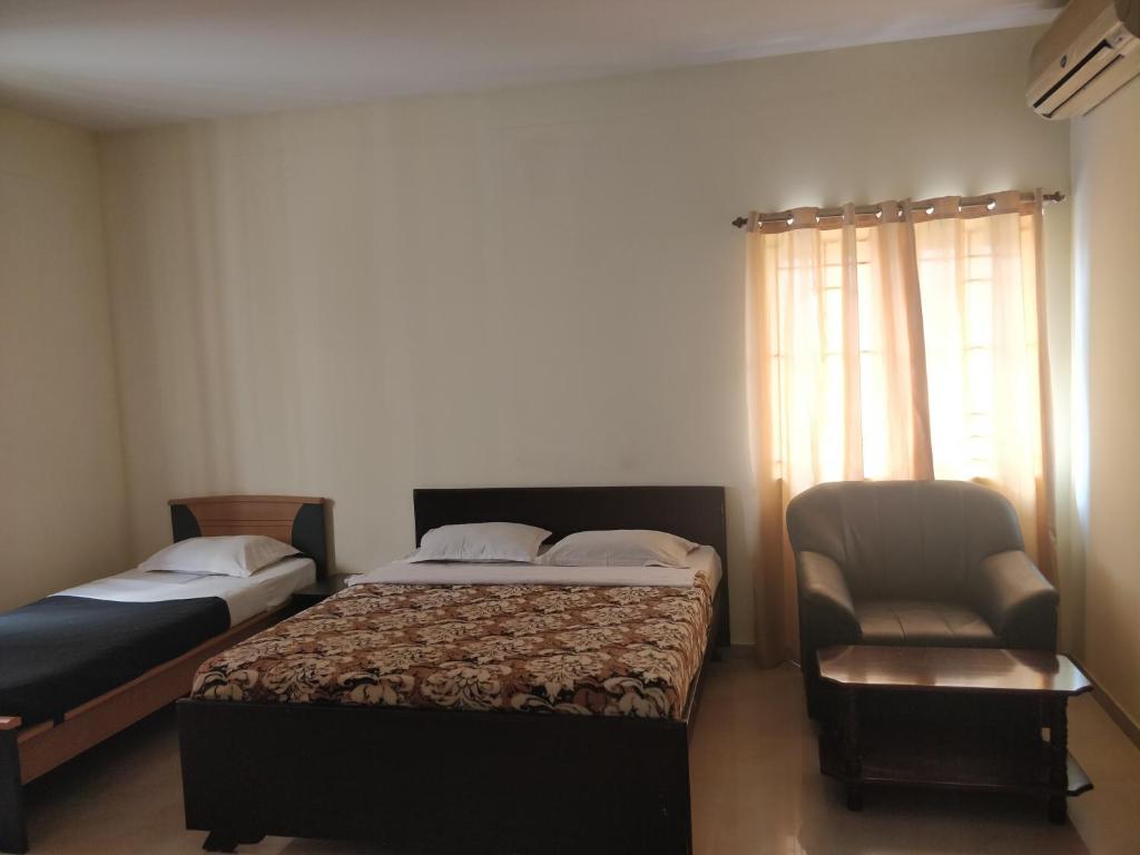 Postel nebo postele na pokoji v ubytování Tulip Suites