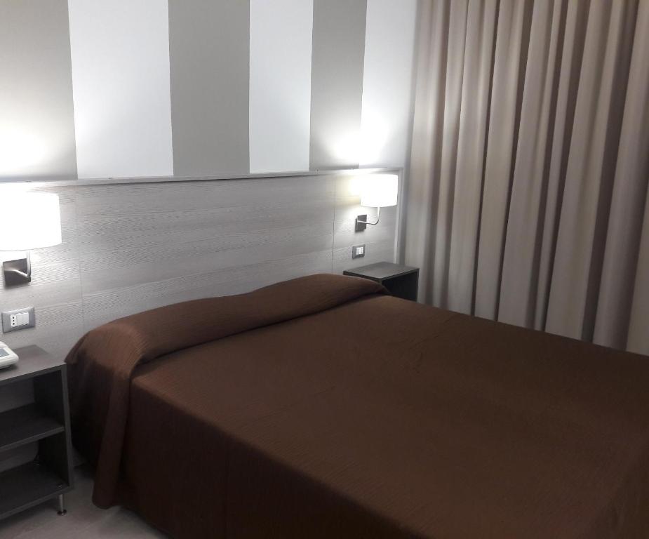 Letto o letti in una camera di Hotel Meranda