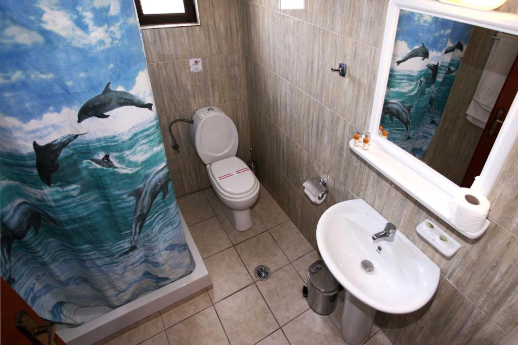 Koupelna v ubytování Hotel Melikari