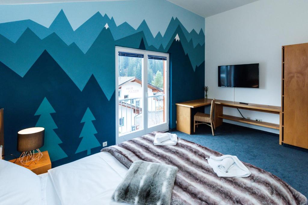 Postel nebo postele na pokoji v ubytování Ibex Lodge