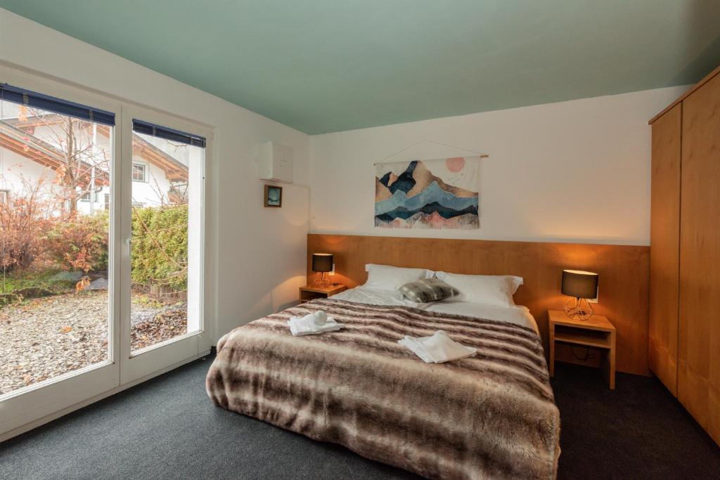 Postel nebo postele na pokoji v ubytování Ibex Lodge