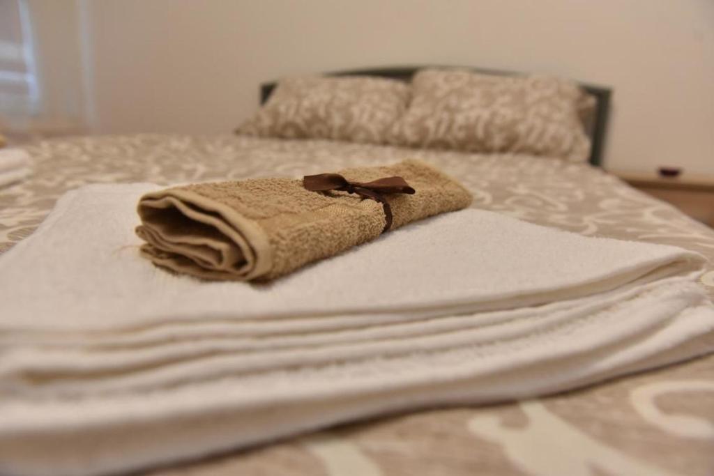 Postel nebo postele na pokoji v ubytování Promenada apartmani