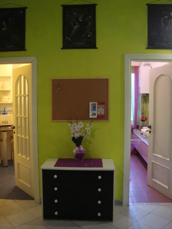 A bed or beds in a room at La Casa Dei Gerani