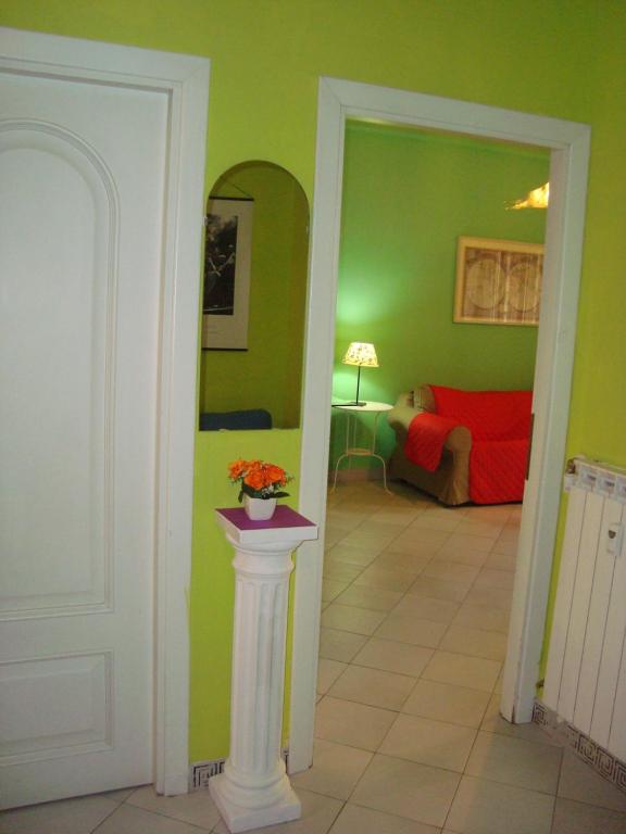 A bed or beds in a room at La Casa Dei Gerani