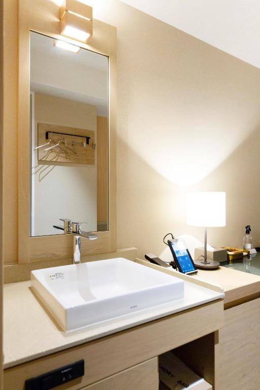 Koupelna v ubytování HOTEL HILLARYS Shinsaibashi