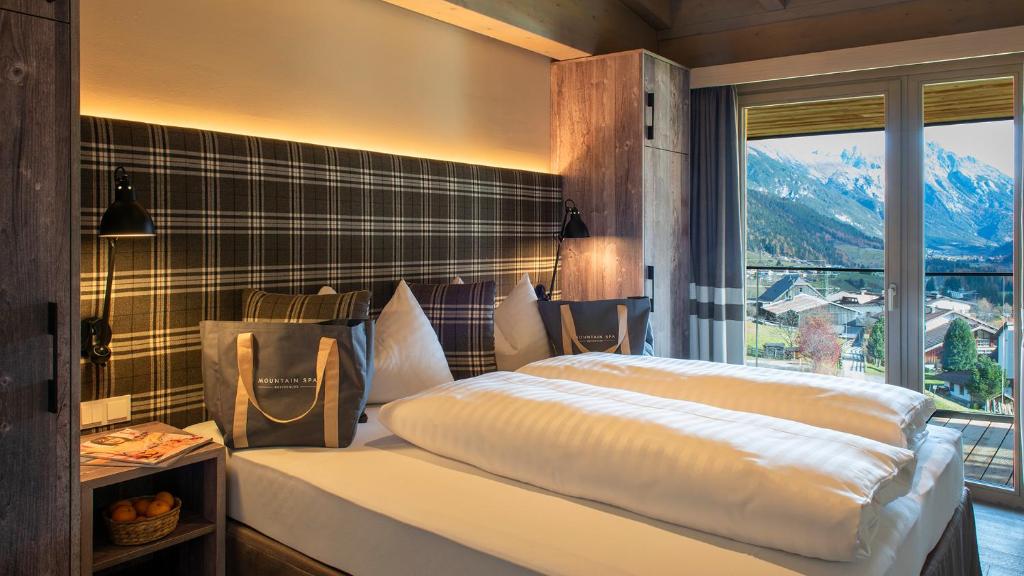 Posteľ alebo postele v izbe v ubytovaní Mountain Spa Residences
