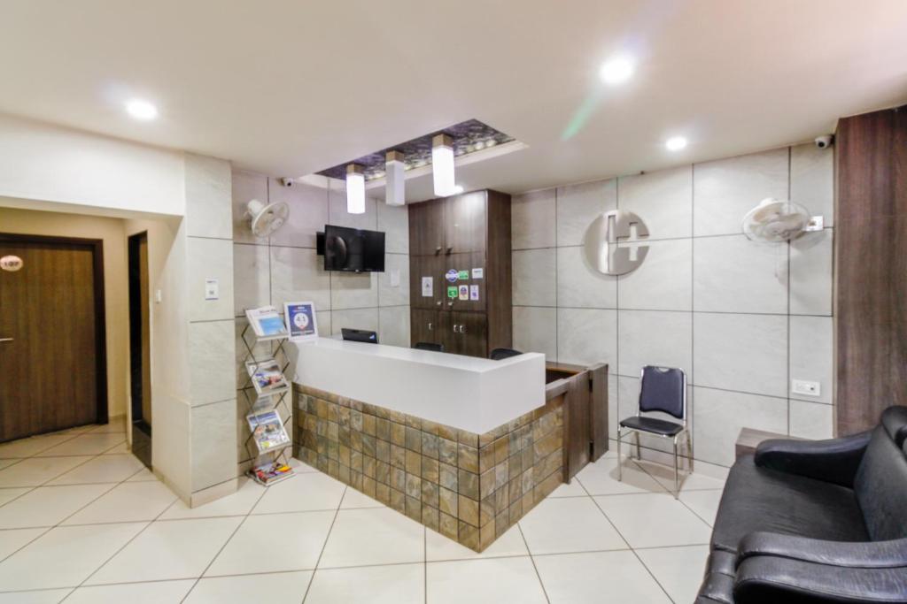 TV a/nebo společenská místnost v ubytování Hotel City Inn