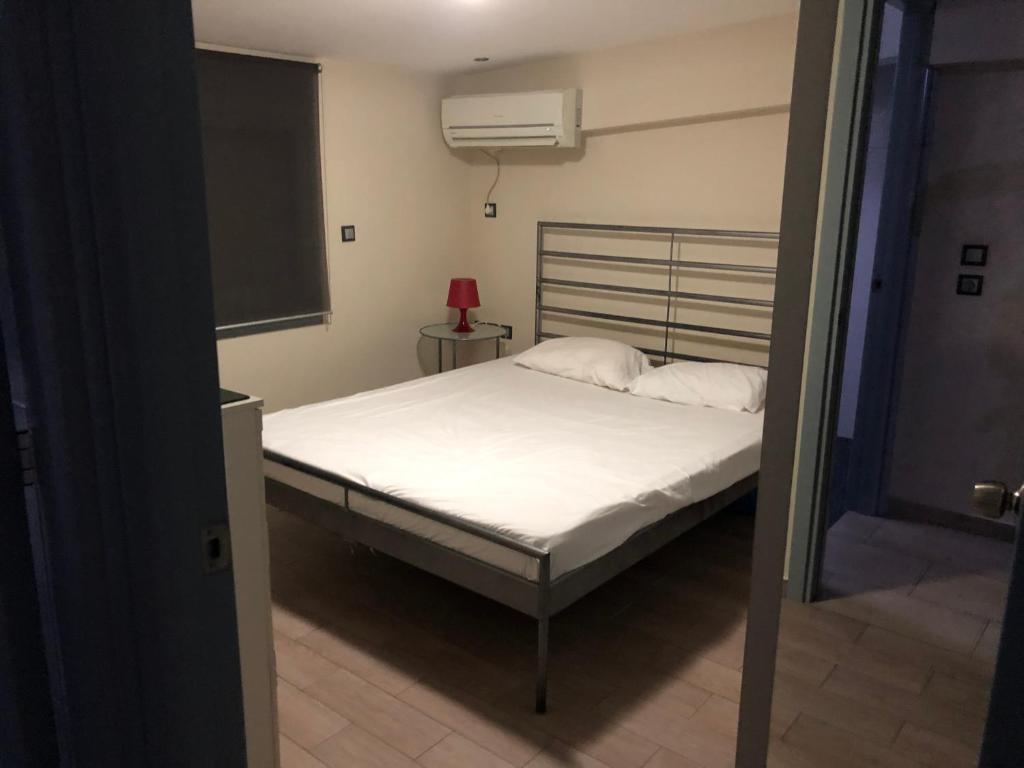 Postel nebo postele na pokoji v ubytování roomotel.com