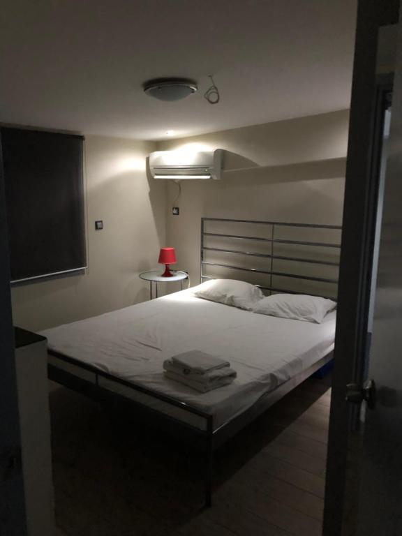 Postel nebo postele na pokoji v ubytování roomotel.com