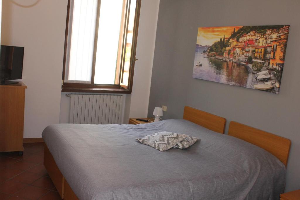 Voodi või voodid majutusasutuse ALBERGO LA SCALETTA toas