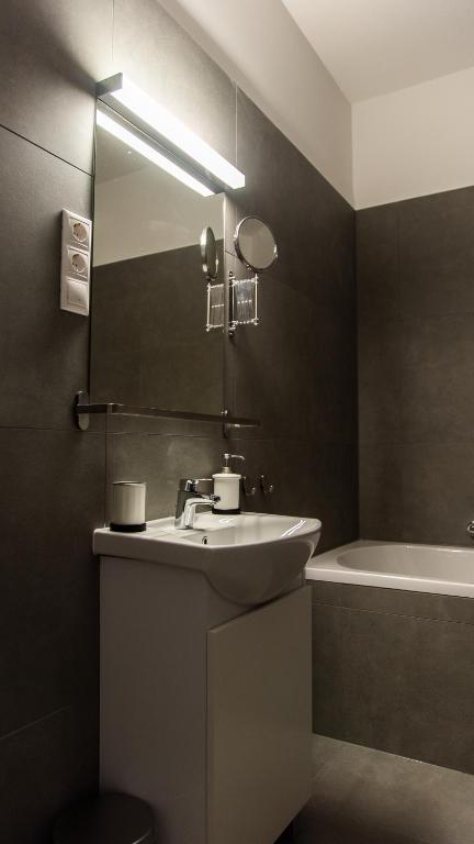 A bathroom at BpR Downtown Gemstone Apartments
