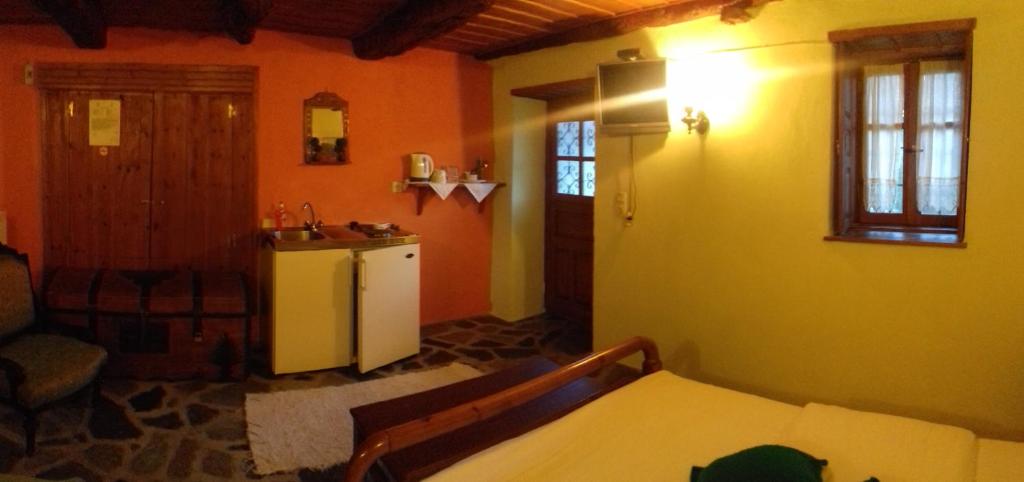 Posezení v ubytování Traditional Rooms karaouli