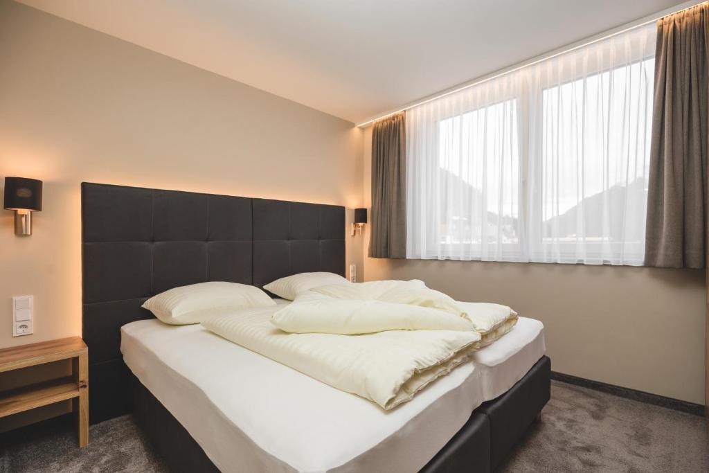 Posteľ alebo postele v izbe v ubytovaní Residenz Gramaser GmbH