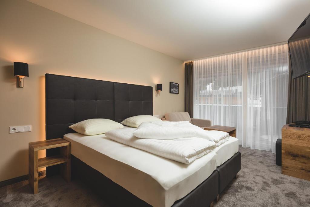 Posteľ alebo postele v izbe v ubytovaní Residenz Gramaser GmbH