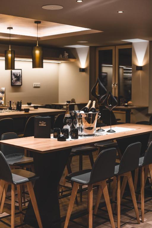 Reštaurácia alebo iné gastronomické zariadenie v ubytovaní Residenz Gramaser GmbH