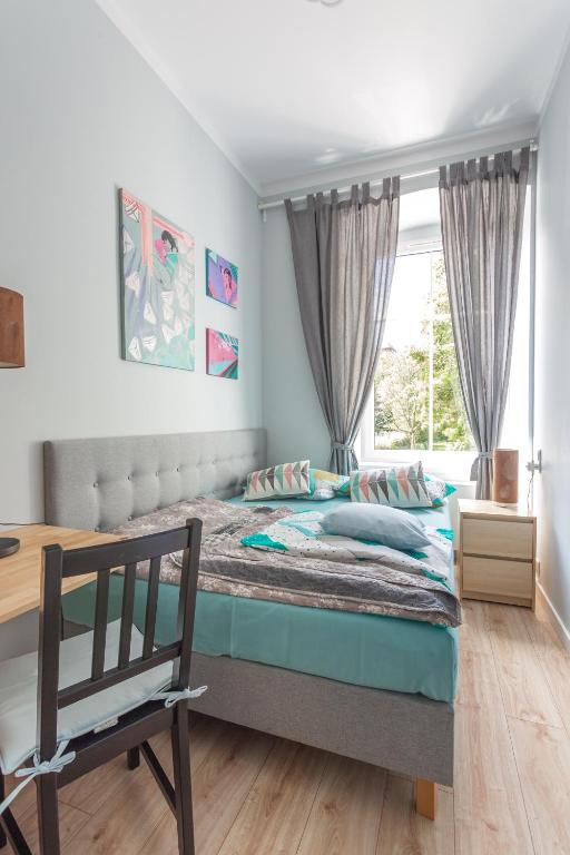 Uma cama ou camas num quarto em Babel Hostel, Dworzec PKP, Rynek