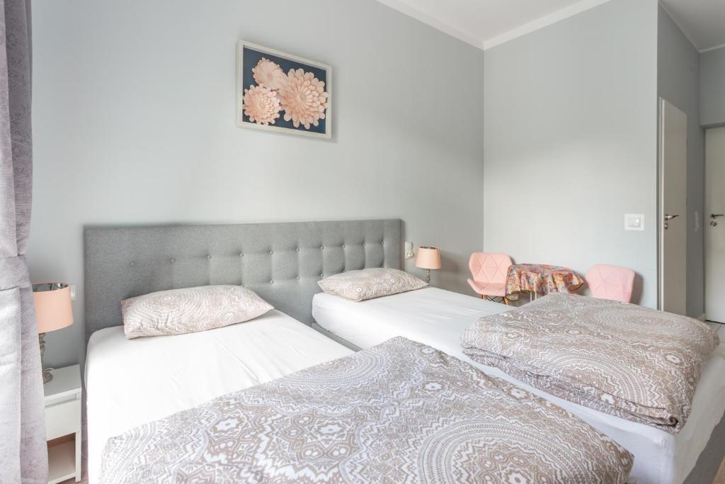 Uma cama ou camas num quarto em Babel Hostel, Dworzec PKP, Rynek