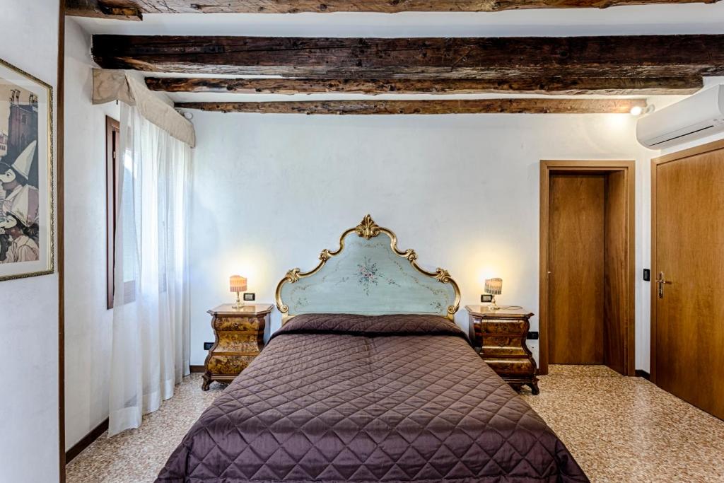 Postel nebo postele na pokoji v ubytování Hotel Guerrato