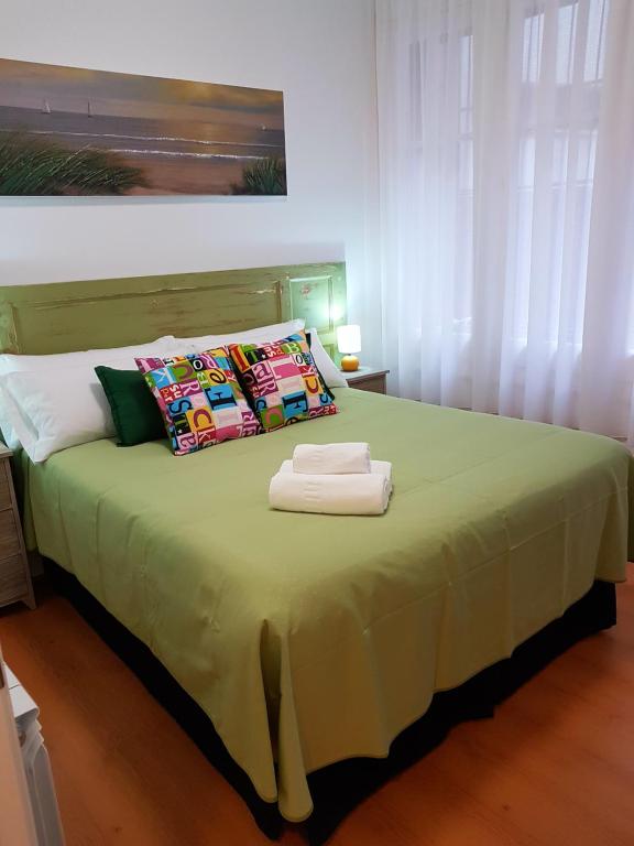 Cama o camas de una habitación en Pensión Sotelo