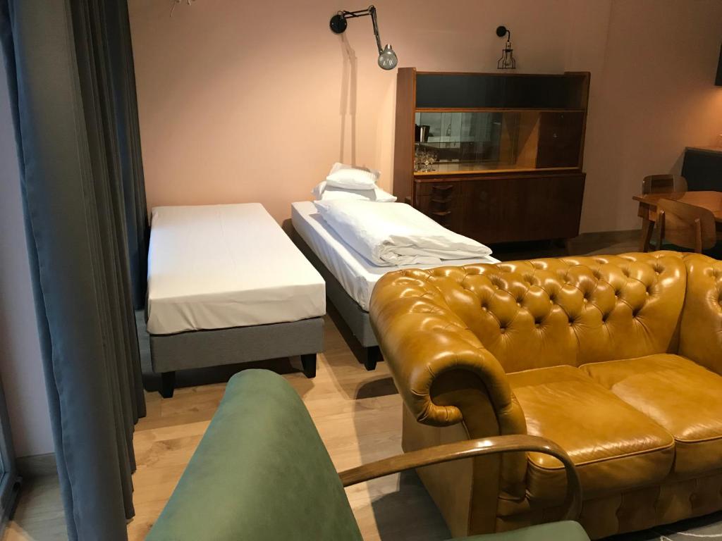 Postel nebo postele na pokoji v ubytování Silesia Apartment Eliza