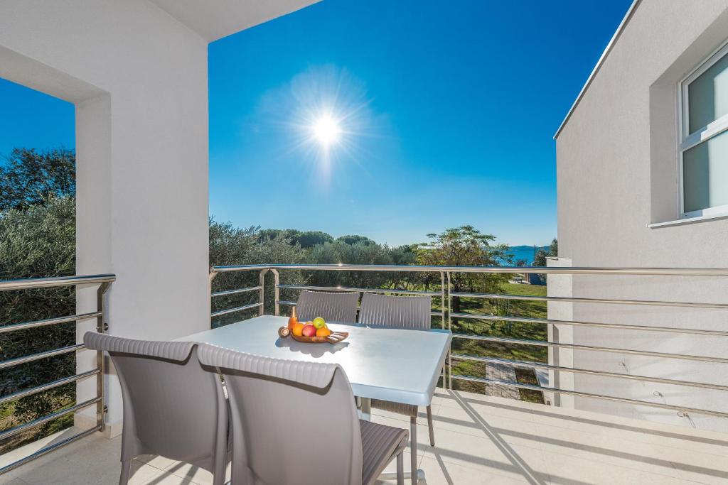 Balkon lub taras w obiekcie Villa Amfora - First row by the sea