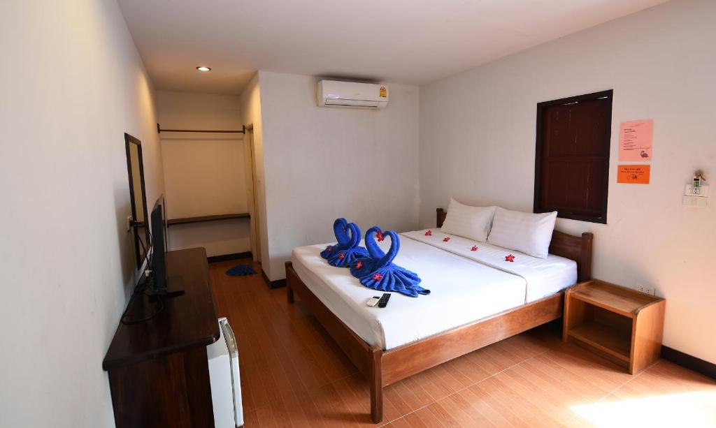 Llit o llits en una habitació de Phi Phi Twin Palms Bungalow
