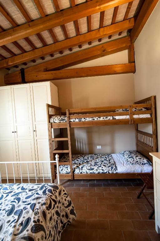 Postel nebo postele na pokoji v ubytování Particolari del Brenta