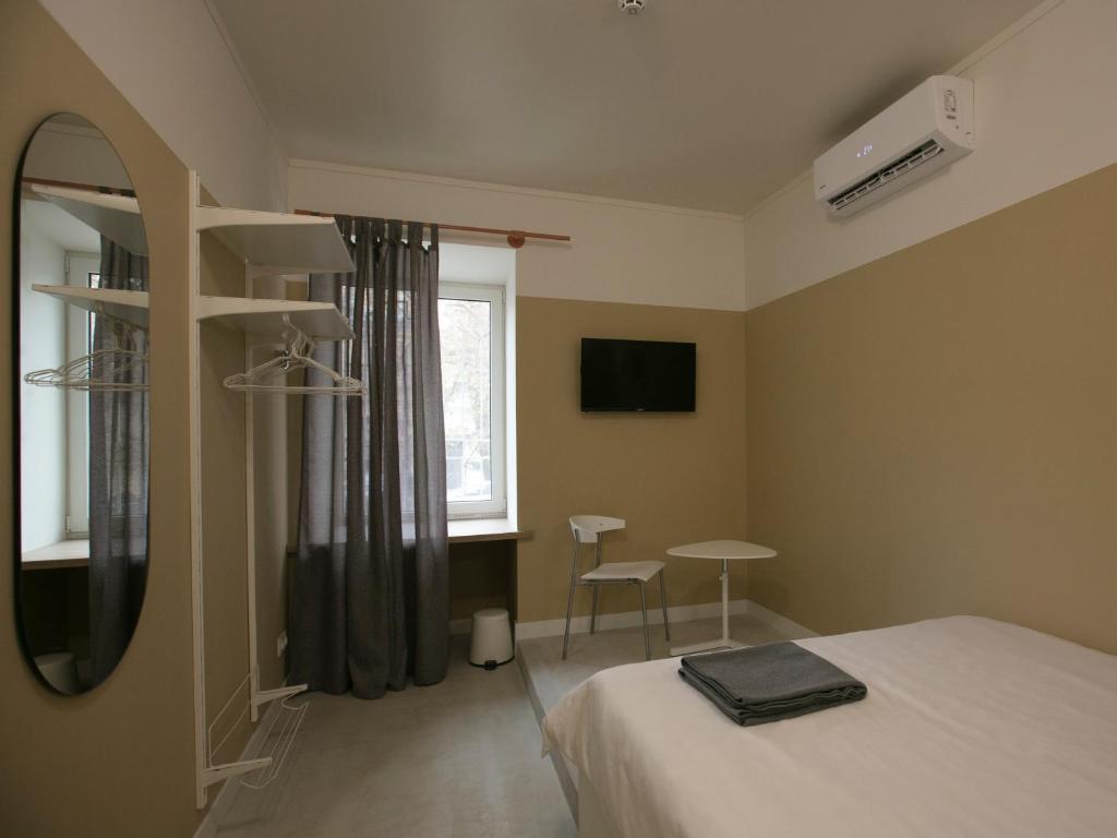 Postel nebo postele na pokoji v ubytování Hotel 0482