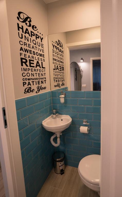 Kúpeľňa v ubytovaní Apartament Hotel Grzybowska 9
