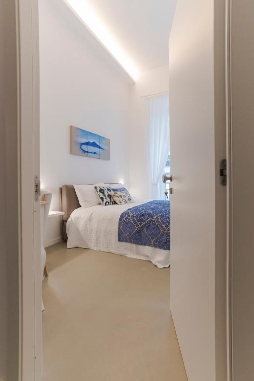 Posteľ alebo postele v izbe v ubytovaní A Misura Duomo Rooms & Apartment - LS Accommodations